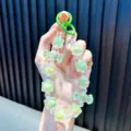 Luminous iridescent green candy beaded phone charm and bag pendant with durable clasps - Green