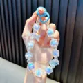 Handheld ice blue crystal candy beaded phone chain keychain with butterfly bow decoration - Blue