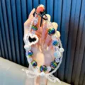 Colorful iridescent beaded phone chain keychain with pixel heart and beaded bow accessory - Black Heart Bowknot Style