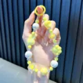 Handmade beaded rabbit and cat paw phone charm in vibrant yellow color - Yellow
