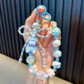 Handmade light blue beaded phone strap with a cute bear charm and bow detail - Blue
