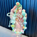 Handheld beaded bear keychain with pastel floral charms in mint green - Green