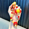 Colorful Christmas beaded phone chain with pom-pom and bell charm for keys and bags - Christmas Bow Bell Style (Beaded Christmas) / Yellow (With Gasket)