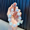 Iridescent light blue butterfly beaded phone charm lanyard for phone cases and keys - Blue