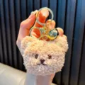 Cute curly plush bear keychain accessory with gold bell and clasp in light beige brown - Teddy Bear / Off White
