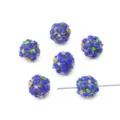 Gedetailleerd overzicht van handgemaakte glazen kralen met blauwe bloembladpatronen voor DIY - 12mm (1 Stuk) / Saffierblauw