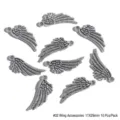Detailed macro view of silver alloy angel wing charms for DIY jewelry making 11x29mm - #02 Style / 10 Pieces