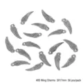 Detailed macro view of silver alloy angel wing charms for DIY jewelry making, 5x17mm size - #05 Style