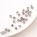 Sparkling silver rhinestone disco ball spacer beads for creative DIY jewelry making crafts. - White K White Diamond