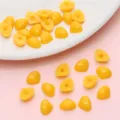 Perle in resina gialle a base piatta triangolari per occhi di bambola fai-da-te - Naso Triangolare (7x9mm) / Confezione da 100 Pezzi / Giallo