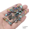 Hand holding irregular iridescent aurora glass beads 7-12mm for DIY jewelry 20pcs - 7-12mm (20 Pieces/Pack) / Mineral Multicolor