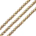 Macro detail of faceted metallic electroplated beads for DIY jewelry making accessories - 2mm (Approx. 180 Pieces/Pack) / KC Gold