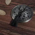 Vintage black silk tassel pendant with antique bronze dragon and phoenix carving detail - 1 Piece / Black