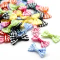 Macro view of colorful handmade plaid fabric bows for DIY hair accessories and craft projects - Random Mixed Colors