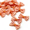 Handmade orange and white gingham ribbon bows for DIY hair clip craft accessories. - Orange Red