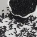 Black glass bugle beads for DIY jewelry and embroidery, scattered around a white bowl. - 15g/Pack Approx 300 Pieces / Black