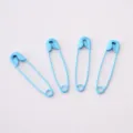 Set of four light blue painted metal safety pins for DIY crafts and clothes - Blue