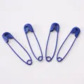 Set of four royal blue painted iron safety pins for DIY crafts and clothing fixings - Sapphire Blue