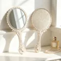 Vintage cream handheld makeup mirror with intricate floral embossed pattern - L / Off White
