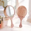 Ornate rose gold handheld makeup mirror featuring vintage floral pattern engraving - S / Rose Gold