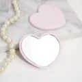 Premium compact pink heart-shaped pocket mirror perfect for makeup and travel gifts. - 6.2*5.2 Single-Sided Heart Mirror / Pink