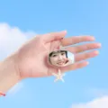 Portable mini makeup mirror keychain with a cute starfish pendant and sky background - 4.1*5.4cm Keychain Mirror / Clear