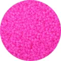 Macro view of frosted neon pink seed beads for DIY jewelry making and crafting - Rose Red