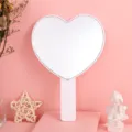 Heart-shaped handheld makeup mirror in soft pink finish for portable beauty - 13cm*18cm / White