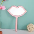 Professional pink lip-shaped handheld makeup mirror displayed in a cute lifestyle setting. - Without Pattern / 12*16cm / Pink
