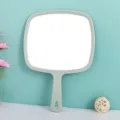 Grote grijze handspiegel met ergonomisch handvat en ophanggat voor cosmetica gebruik - Paper doos / 23*32.5cm / Lichtgroen