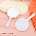 Minimalist round white handheld makeup mirror with compact 7.5cm x 13.5cm dimensions - 5.5x10cm / White