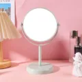 Rotatable desktop makeup mirror with round frame on a decorative pink background - Round Double Sided Mirror - Medium / Light Green One Side Magnification
