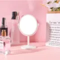 Minimalist white circular rotating tabletop vanity mirror with a steady plastic stand - Large (Double-Sided 2x Zoom) / Off White