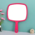 Grote roze handmake-upspiegel met ophangbaar handvat voor schoonheids- en tattoosalons - Paper doos / 23*32.5cm / Rozerood