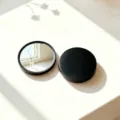 Portable round compact makeup mirror with minimalist black matte frame and high-definition glass - 7x7 / Black