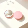 Compact portable round makeup mirror in matte pink finish for travel and daily touch-ups - 7x7 / Pink