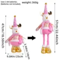Telescopic pink Christmas reindeer plush doll showing both extended and retracted sizes - Glowing Musical Pink Reindeer Style (L3-38)