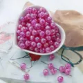 Close-up of pink acrylic crackle bubble beads with AB coating for DIY jewelry - 8mm (50pcs/pack) / Rose Red