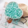 Teal AB iridescent acrylic bubble beads for DIY bracelet jewelry making craft projects. - Light Blue