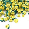 Detailansicht gelber Wassermelonen-Polymer-Ton-Perlen für kreative DIY-Schmuckprojekte - Dreieck Wassermelonen Stil (Gelb)
