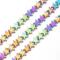 Close-up of rainbow electroplated hematite star beads for DIY jewelry making - Rainbow
