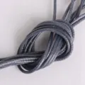 Macro view of 2mm dark grey waxed cord for handmade DIY jewelry necklace making - 5 Meters (2mm) / Dark Gray