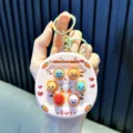 Mini llavero electrónico rosa de juego de golpear al topo para mochila y antiestrés - Rosa