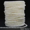 Detailed macro view of 5mm cream white ABS faux pearl bead chain wound on spool - Round Style / 5mm 5m Pack / Beige