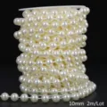 Close-up detail of 10mm cream ABS imitation pearl bead chain on spool for DIY wedding decor - Round / 10mm 2m Pack / Beige