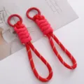 Robuster geflochtener Schlüsselanhänger aus Polyester mit rotem Karabiner, 2er-Set Rot Pink - 1 Stück / Rot