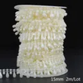 Close-up of cream white teardrop ABS imitation pearl chain, 15mm bead size, 2m roll - Teardrop / Width 15mm 2m Pack / Beige
