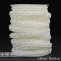 Close-up of ivory 10mm ABS pearl chain roll for DIY wedding flower decor - Square Shape / Width 10mm 5m Pack / Beige