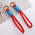 Roter und blauer geflochtener Schlüsselanhänger mit dickem goldenem Legierungsring - 1 Stück / Rot Goldene Schnalle