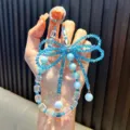 Eleganter blauer Kristallperlen-Handyanhänger mit Schmetterlingsschleife und Perlen - Blau